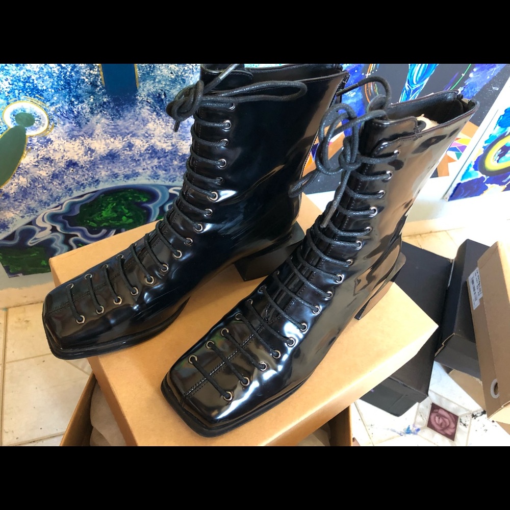 Square toe lace up boots.